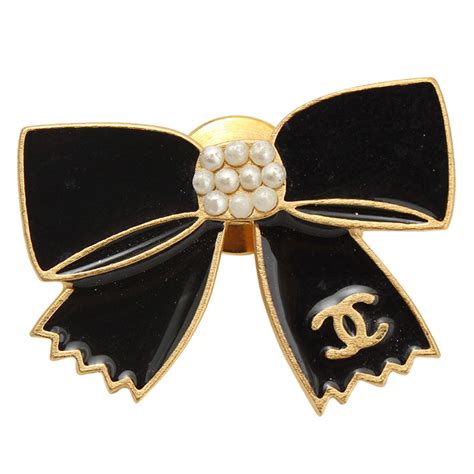 black chanel bow|chanel brooches for women.